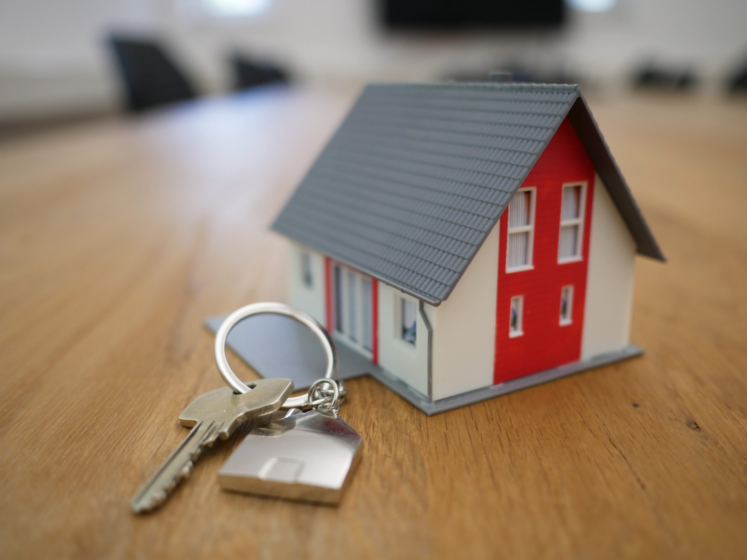 Photo of a tiny home model with a key set